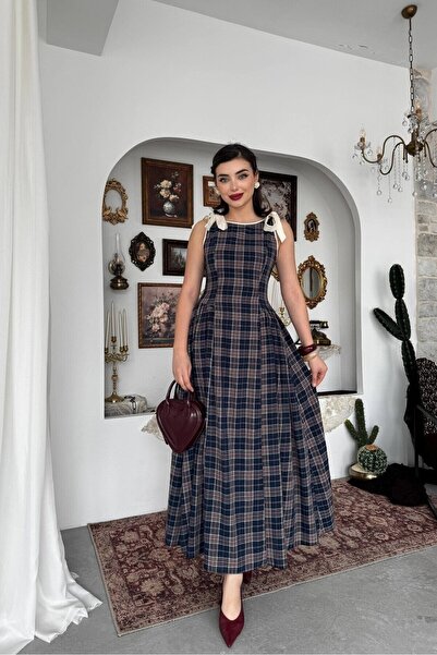 Caddebostan Moda فستان ميدي منقوش بتفاصيل فيونكة وحزام