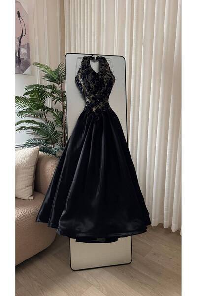 Dubai Black Gown with Luxurious Gold Embroidery and a Sweeping, Elegant Skirt...