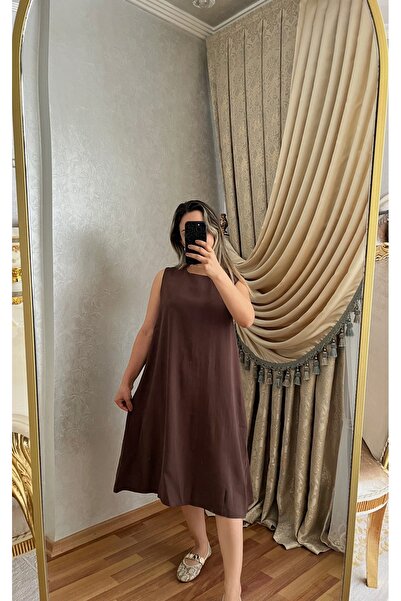 TENSEL KUMAŞ ELBİSE CEP DETAYLI MAXİ BOY