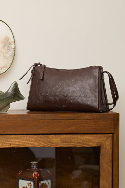 Manuka Prisma form leather bag hot coffee