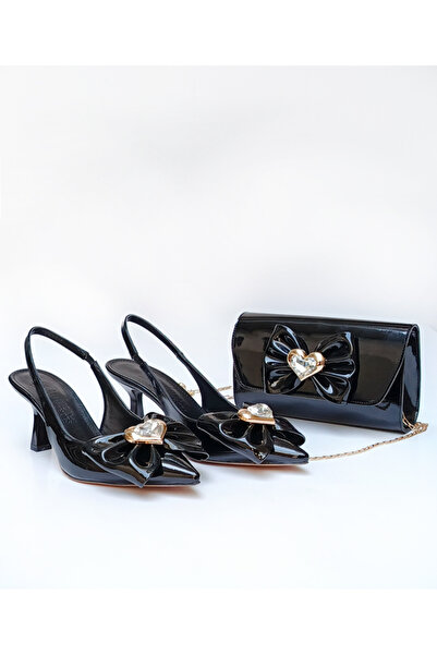 DUDYEN SHOES Women's Black Patent Leather Bow and Stone Accessory 7 cm Heeled...