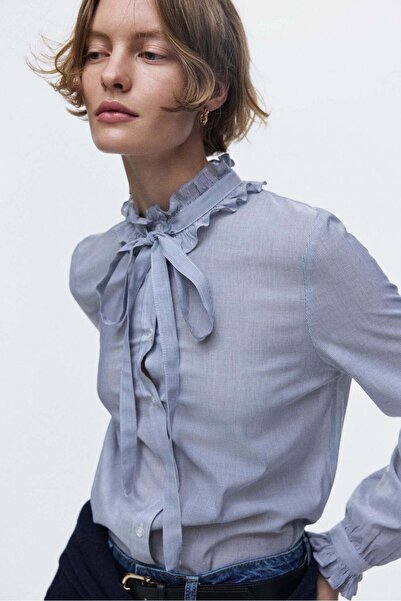 H&M بلوزة مزينة بالكشكشة