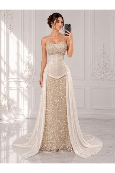 ranin Ivory Evening Dress with Beaded Embroidery and a Shiny Stretchy Train.