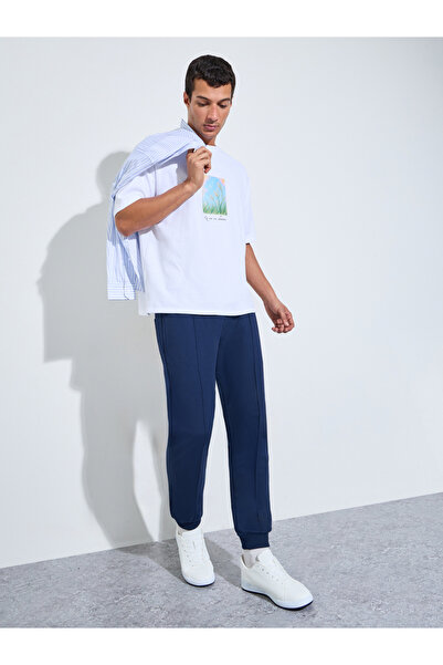 Styli Men Navy Blue Solid Slim Fit Cuffed Joggers