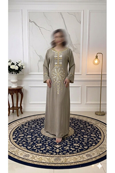 ISHRAQAT AL-AMAL Elegant dress with luxurious gold embroidery