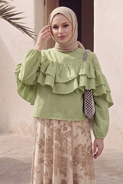InStyle Pistachio Green Blouse with Ruffles on the Sleeves and Front