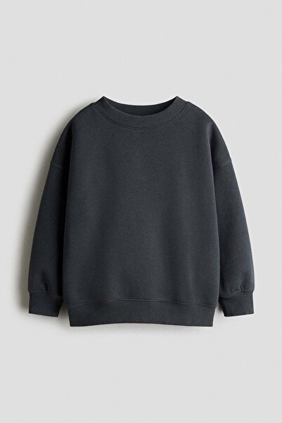 H&M بلوزة كبيرة الحجم برقبة دائرية
