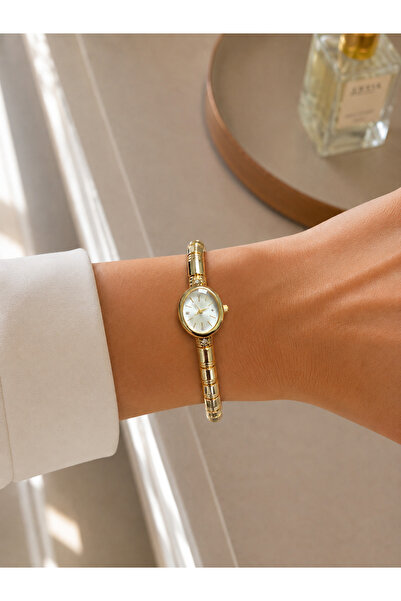 Boris Accessory Women's Wristwatch Gold Color Minimal Oval Dial Thin Bracelet...