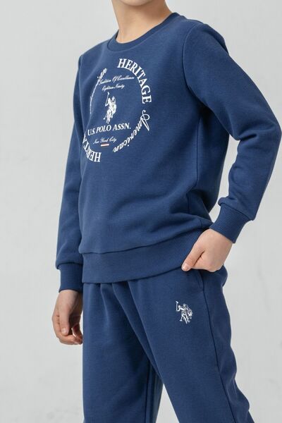 U.S. Polo Assn. طقم بدلة رياضية للأولاد مطبوعة باللون الأزرق بأكمام طويلة US2...