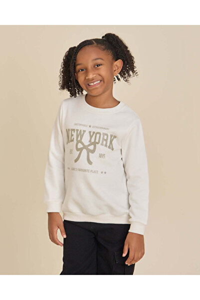 REDTAG Girls Cream New York Glitter Varsity Print Sweatshirt
