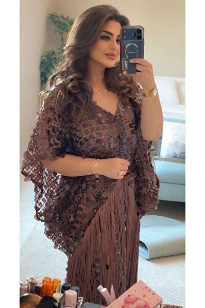 FASHION فستان سهرة فخم بتصميم كاب وشبكة مطرزة بقطع براقة مع شراريب انسيابية ي...
