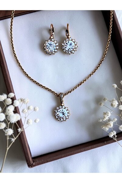 FAYRA ACCESSORIES مجموعة قلادة وأقراط على شكل شمس من حجر الكريستال