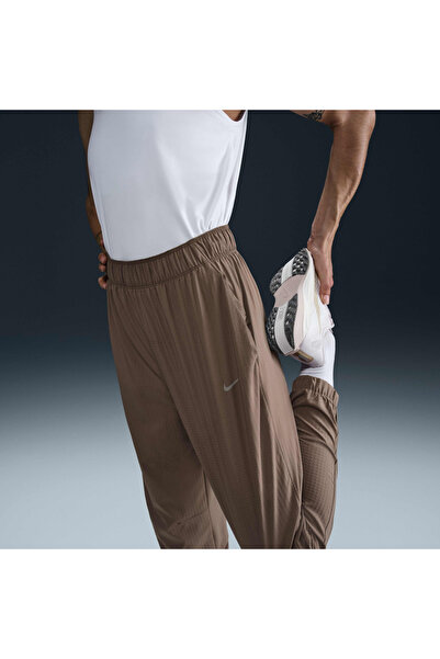 Nike Dri-Fit Fast Mid-Rise 7/8 Warm-Up Running Kadın Eşofman Altı