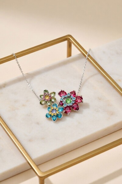 RMY MODA Women's Silver Multi-Flower Figured Crystal Stone Row Chain Necklace