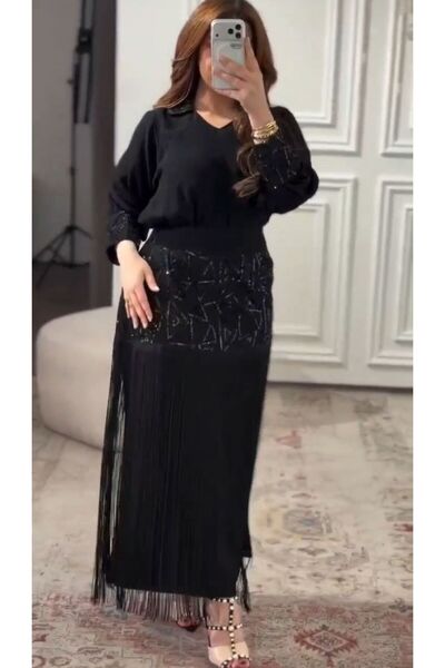 NALA FASHION فستان سهرة أسود طويل يمنح حضورًا قويًا وأناقة لافتة.