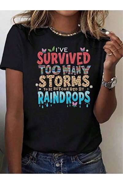 k222 قميص نسائي مطبوع عليه 'I Survived Storms' بأكمام قصيرة وياقة دائرية مع ن...
