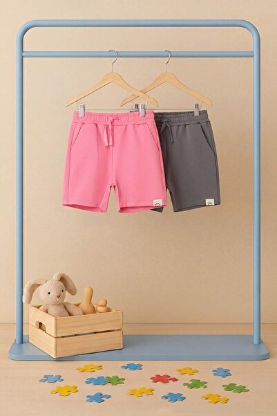 TRENDYOLKIDS شورت محبوك مسطح باللون الرمادي والوردي وبرمودا TKDSS26SR00029