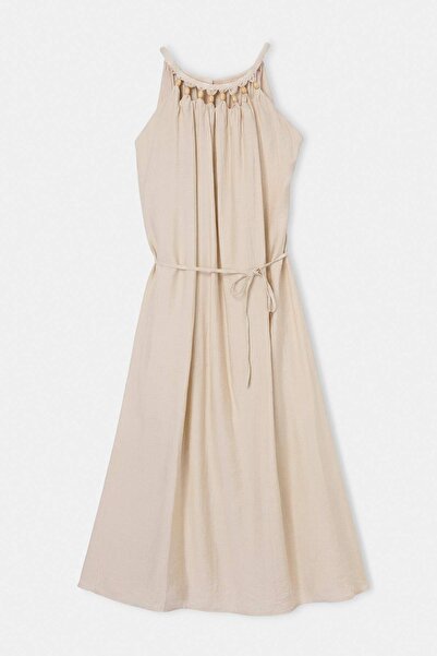 Drop by TrendyolMilla فستان طويل بيج مزين بالخرز مع أربطة عند الخصر TDRSS26EL...