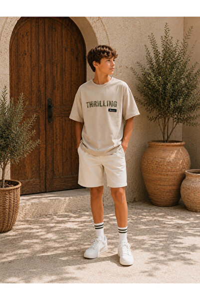 Orca Kids Fashion 9-14 تي شيرت كارينوس المثير باللون الحجري