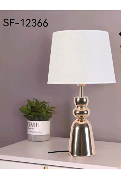 Generic This Is a Gold-Colored Table Lamp.