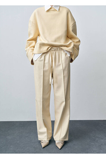 MANGO Woman Deri görünümlü Wideleg pantolon