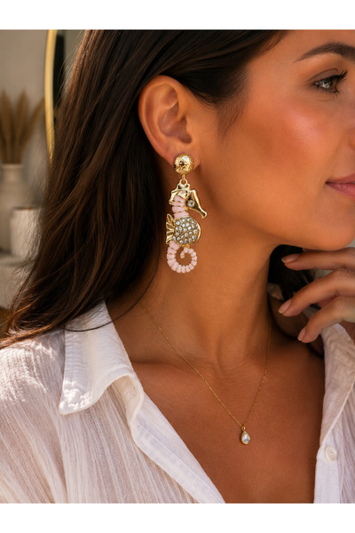 ANKA JEWELLRY أقراط نسائية من الفولاذ بتصميم حصان البحر من ماركة PUDRA MINELI...