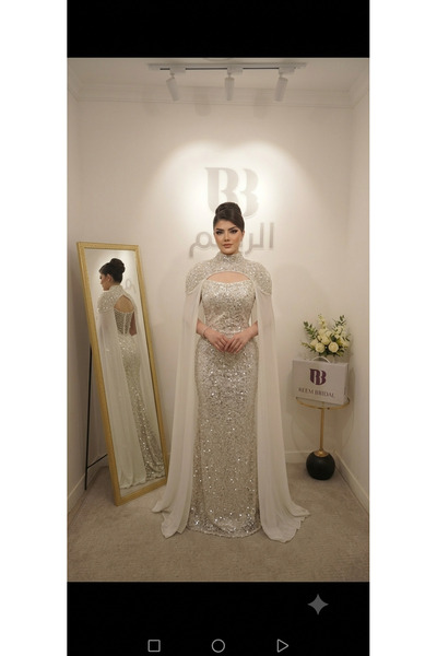 Reem bridal فستان سهرة كاب مطرز بياقة عالية (Sheath Sequined Gown with Cape)