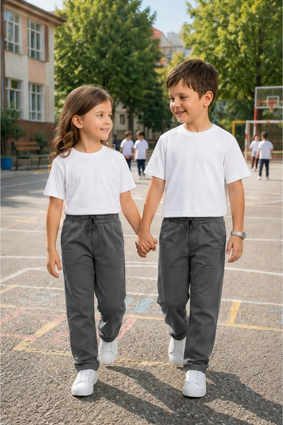 YAKAMEL UNISEX KIZ ERKEK ÇOCUK LİKRALI EŞOFMAN BEL RAHAT KALIP BELİ BAĞLAMALI...