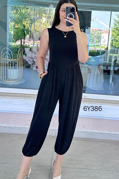 İnce Topuk Zero Sleeve Sandy Fabric Jumpsuit 6Y386