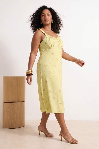 Trendyol Curve Κίτρινο φλοράλ μοτίβο με τιράντες Πλεκτό φόρεμα μίντι σε γραμμ...