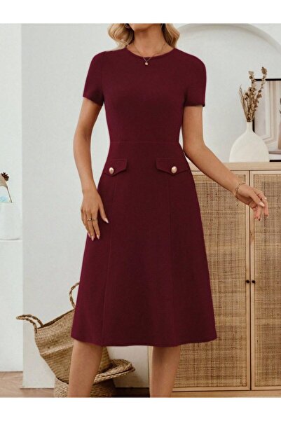 Kokosh moda Γυναικείο κομψό μίντι φόρεμα με κοντό μανίκι και τσέπες