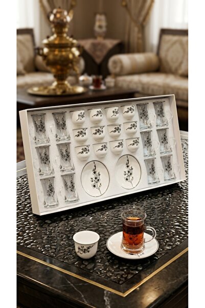 Generic A luxurious hospitality set – coffee cups and tea glasses with elegan...