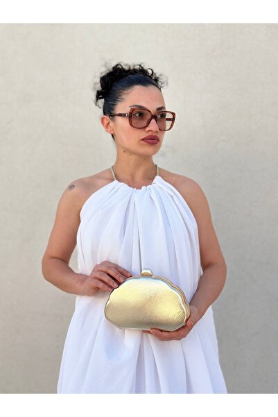 she poly Ženska zlatna metalik večernja torba model Oyster