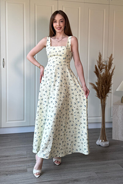 Dilay Gökoğlu Butik Çiçekli Kare Yaka Arkası Fiyonk Detaylı Midi Sarı Elbise