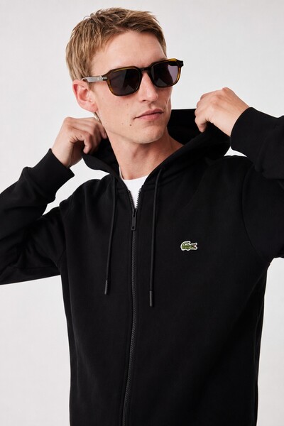 Lacoste سويت شيرت رجالي كلاسيكي بقصة مريحة وسحاب كامل، قابل للتعديل بغطاء رأس...