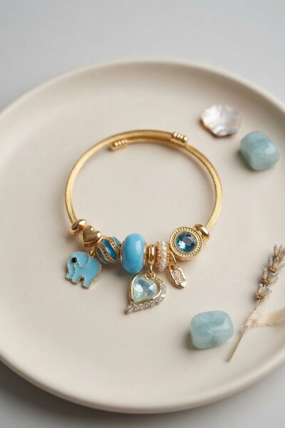 Inure Jewelry سوار على شكل قلب وفيل باللون الأزرق