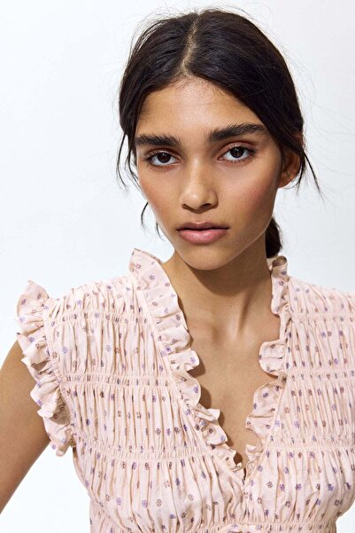 H&M Sleeveless smocked blouse