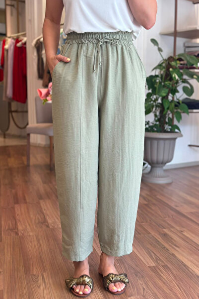 Unique Boutique بنطلون من قماش الكاكي تينسل بطول الكاحل مع خصر مطاطي