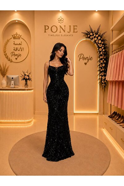 genric فستان سهرة يجسد قمة الحرفية في التصميم