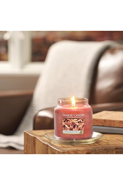 Yankee Candle شمعة معطرة |   شمعة كبيرة على شكل عود قرفة في وعاء زجاجي |   شم...