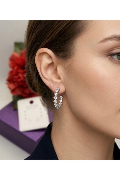 XUPING JEWELRY حلق من الفولاذ باللون الفضي مرصع بحجر الزركون على شكل مسار مائي