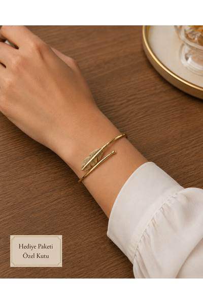 HER ŞEY NOTA www.herseynota.com Elegant Feather Figured Gold Color Women's Br...