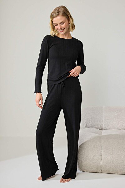Trendyol Kollektion Schwarzes Baby-Overlock-Strick-Pyjama-Set aus weichem Tuş...