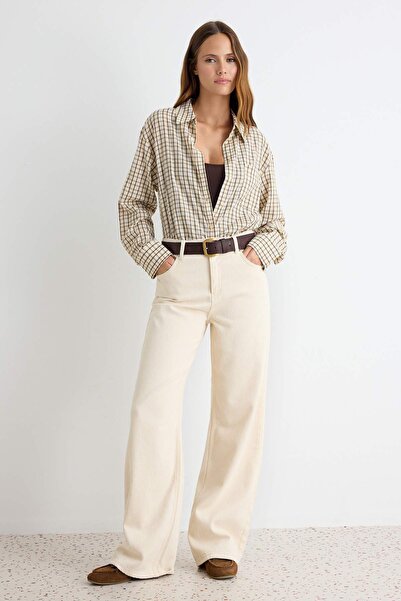 Trendyol Collection بنطلون جينز واسع الساق بخصر مرتفع مصنوع من القطن بنسبة 10...