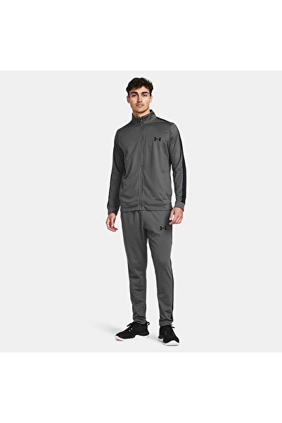 Under Armour بدلة رياضية منسوجة بشعار الماركة