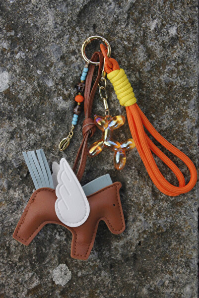 CULTE Le Toutou Bag Charm - Turuncu ve Kahverengi Unicorn Figürlü Çanta Akses...