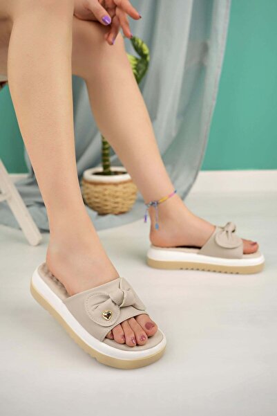 Nesil Shoes شبشب نسائي من Dvm 650 بنعل تدليك باللون البيج والأبيض