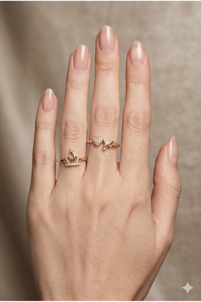 PABALAS Stainless Steel Gold Heart and Crown Figured 2-Piece Women's Ring Set...