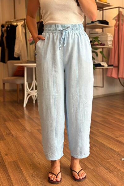 Unique Boutique بنطلون بطول الكاحل من قماش التينسل الأزرق مع خصر مطاطي بنطلون...