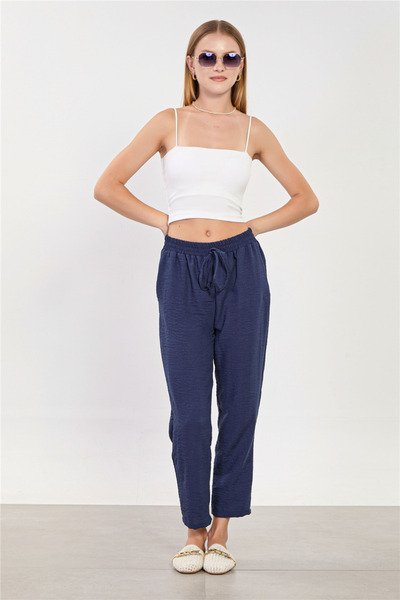 BARRELS AND OIL Women's tie-waist carrot pants - navy blue